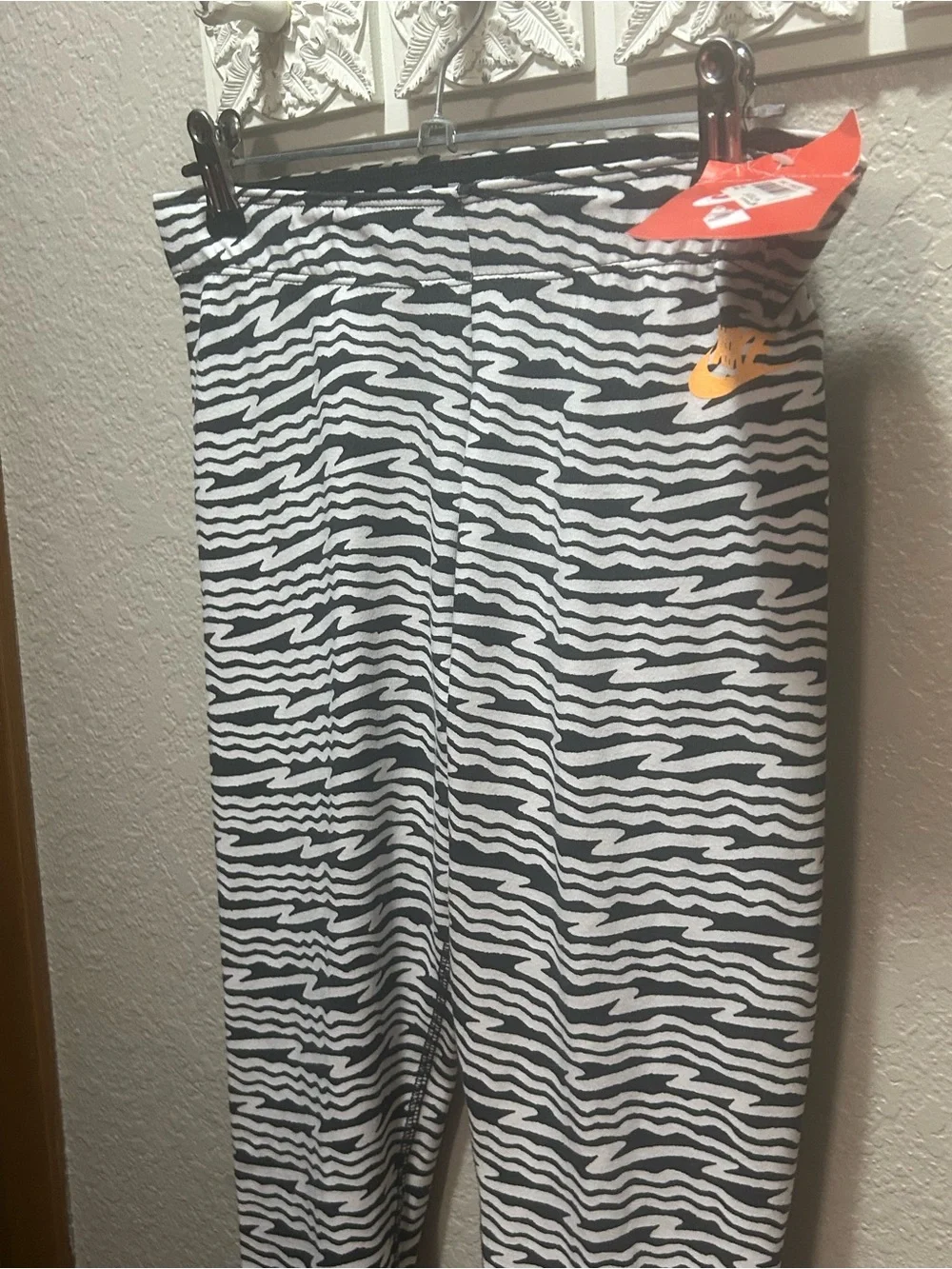 Nike Black and White Zebra Print Leggings with Orange Swoosh